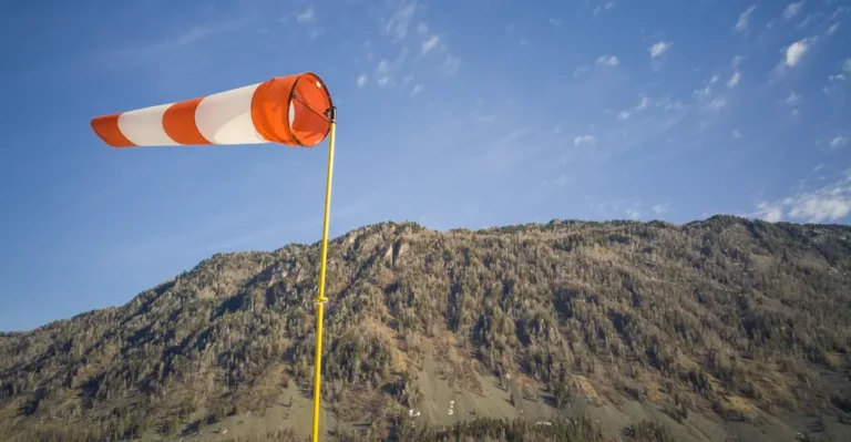 scenic view windsock against mountain sky