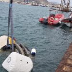 Cadavere recuperato in auto nel porto: indagini in corso